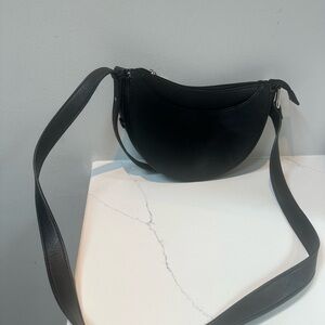 K. Carrol Black Crescent Crossbody Bag